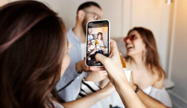 girl taking pictures of friends